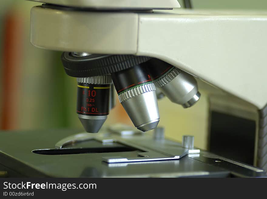 Detail of microscope lenses in a laboratory