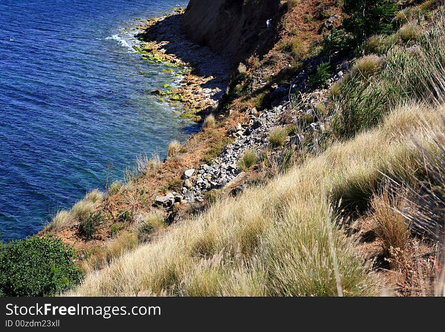 Seascape of blue mediterranean sea, a steep slope and coast. Italy. Seascape of blue mediterranean sea, a steep slope and coast. Italy