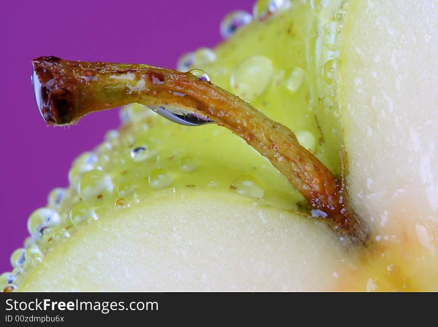 Fresh apple covered with dew