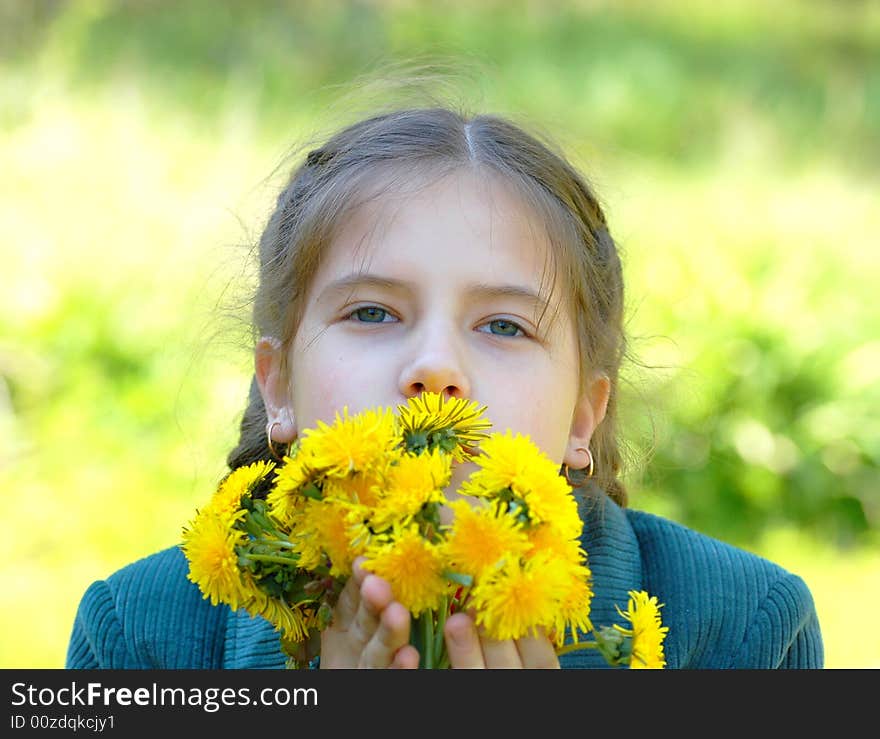 Girl with bouqet of dandelions. Girl with bouqet of dandelions