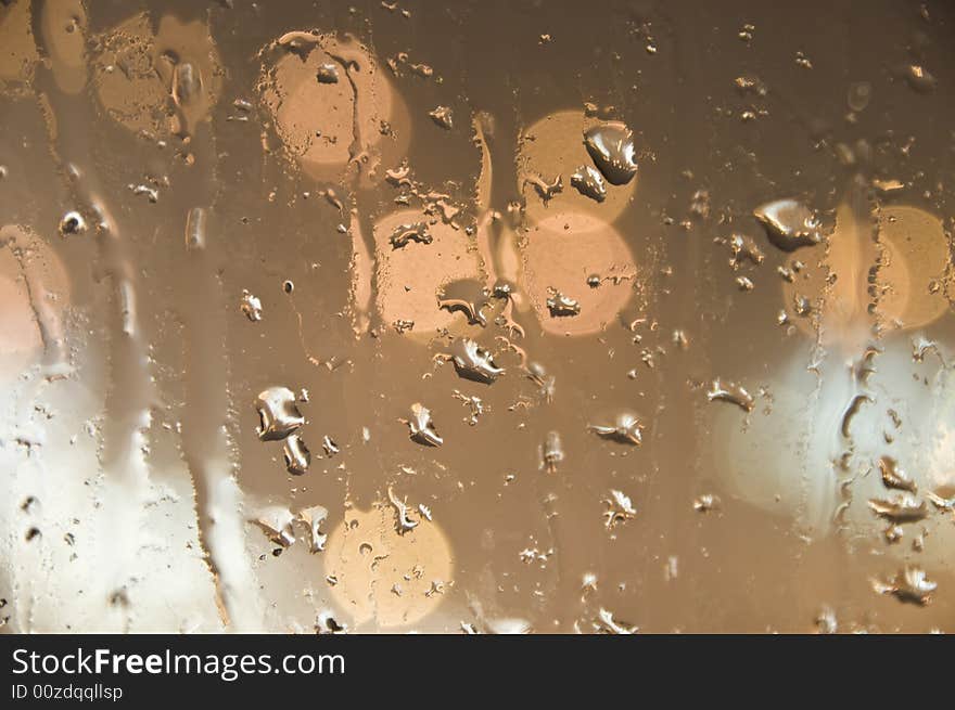 Close up shot of rain droplets on window