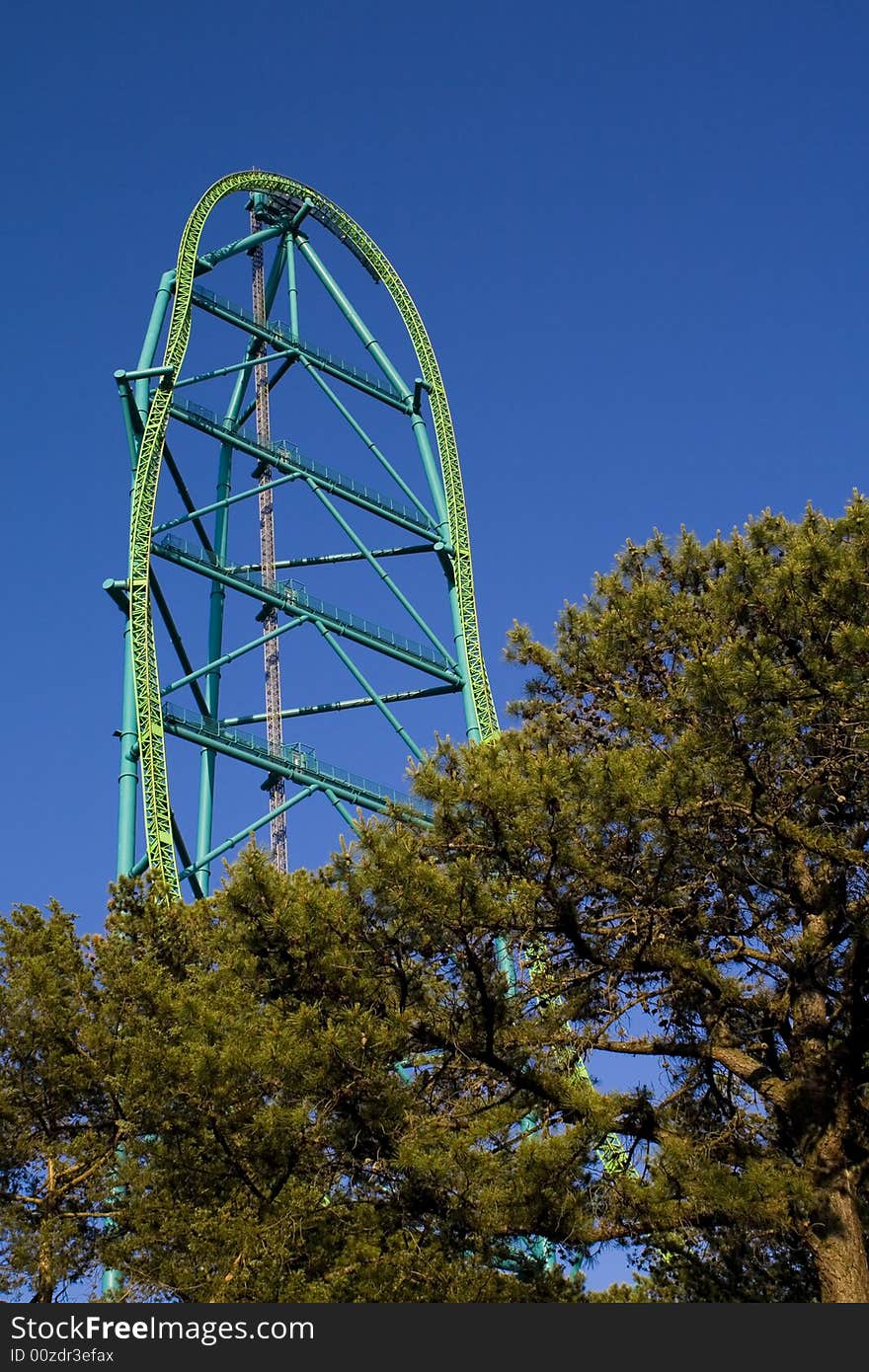 Very tall and fast roller coaster in a theme park