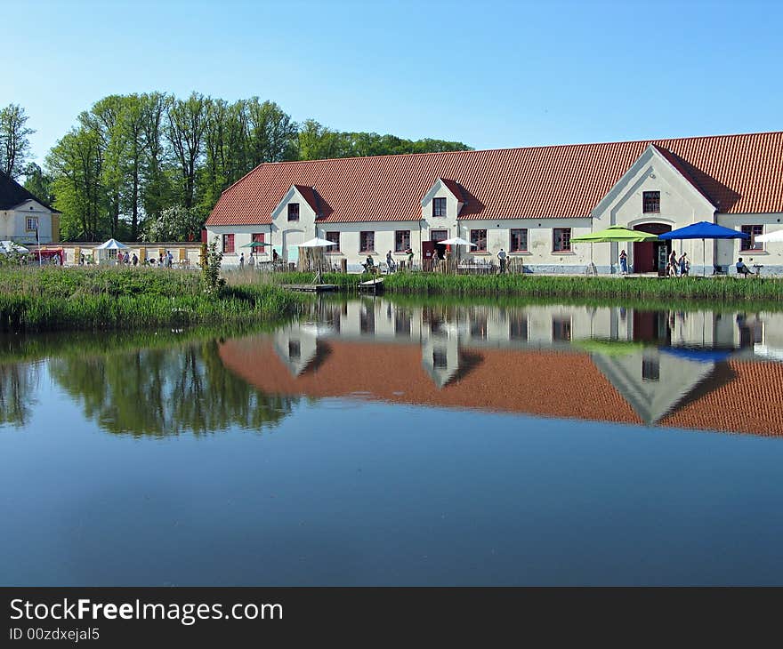 Castle buildings reflected in the water Valdemar Slot Denmark. Castle buildings reflected in the water Valdemar Slot Denmark