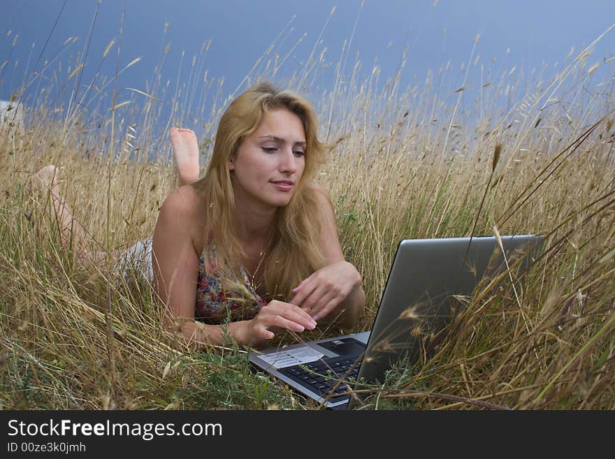 Girl In A Floor With Laptop