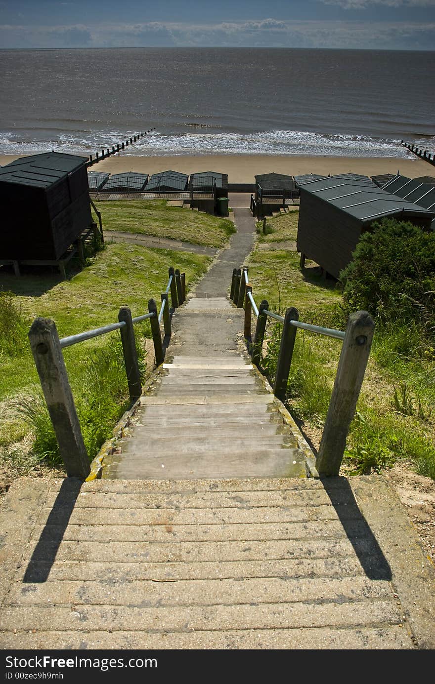 Steps down to the Sand,Sea and Beach Huts at Frinton. Steps down to the Sand,Sea and Beach Huts at Frinton