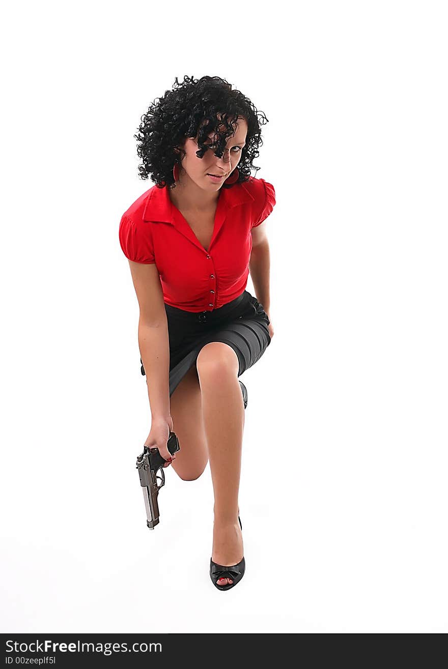 Woman with the gun on the white background