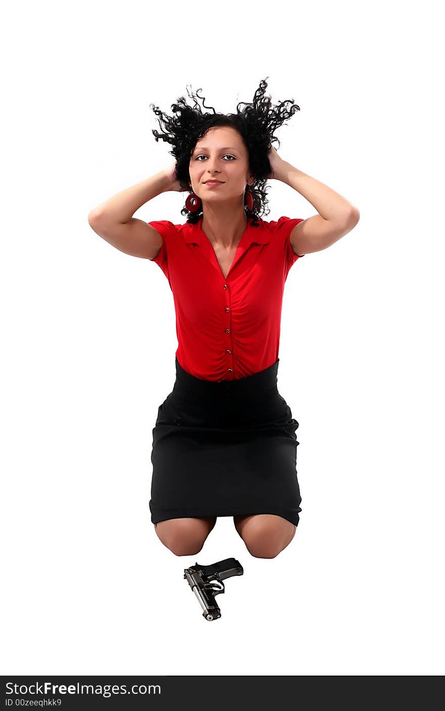 Woman with the gun on the white background