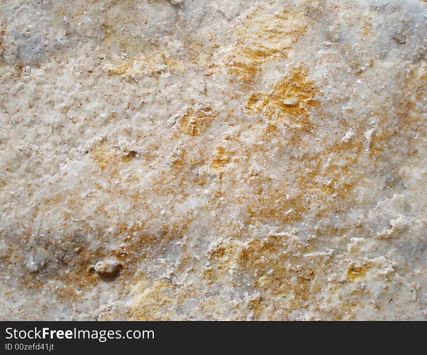 Stone with yellow spots, texture