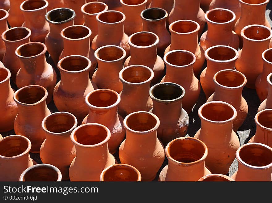 Brown clay pots on the ground