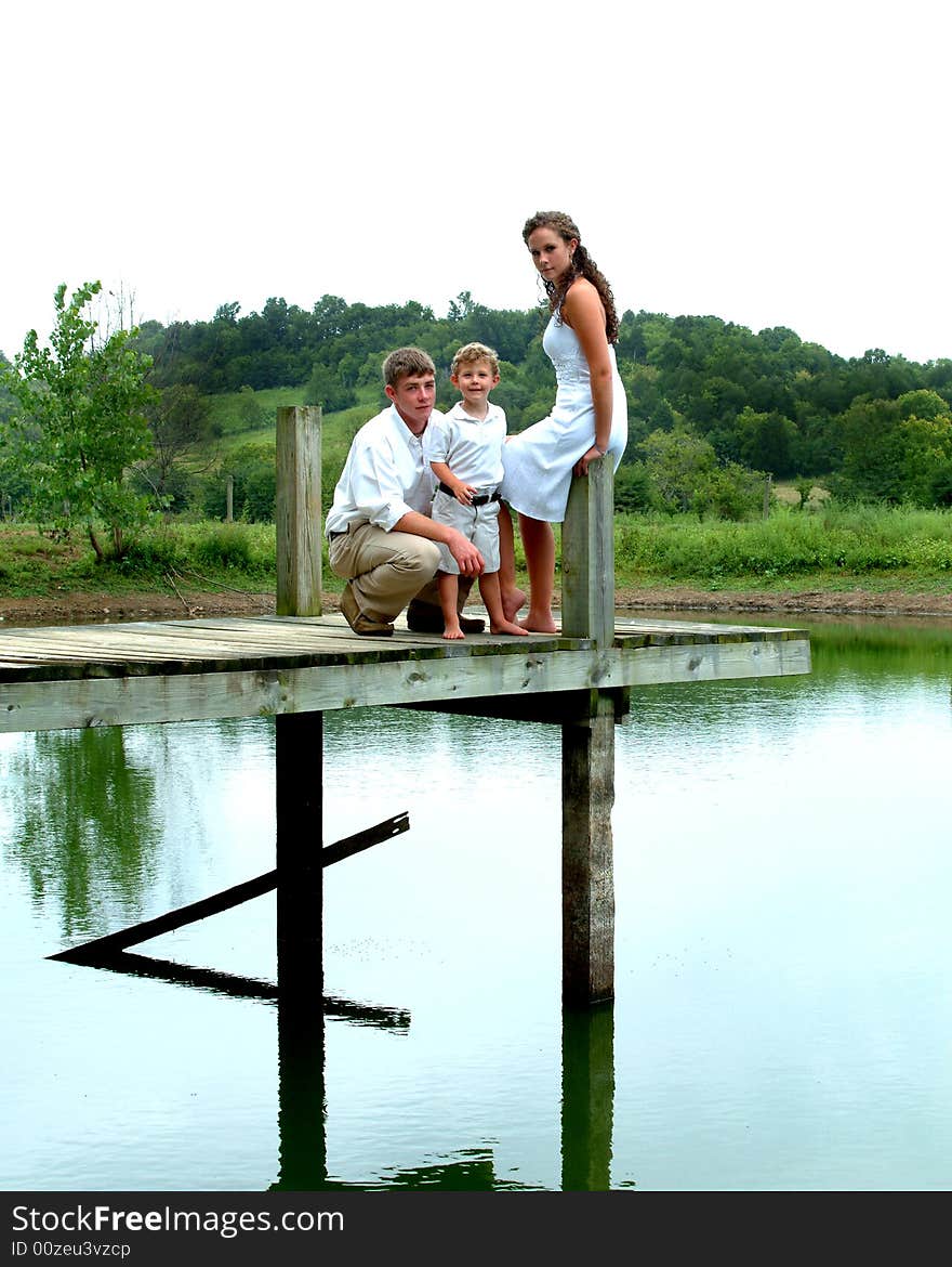 Siblings On Pier