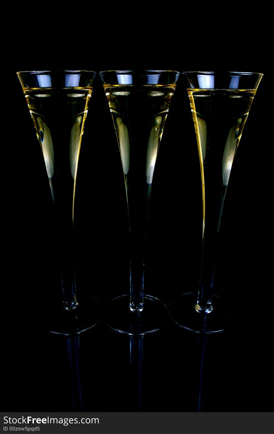 Sparkling wine isolated against a black background