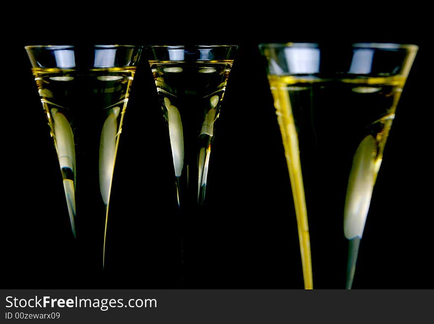 Sparkling wine isolated against a black background