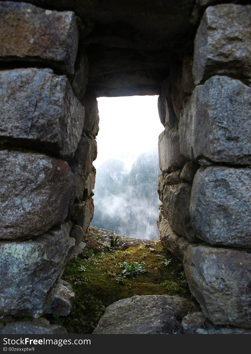 The lost city of the inca Machu Picchu in Cuzco, Peru. Inca window.