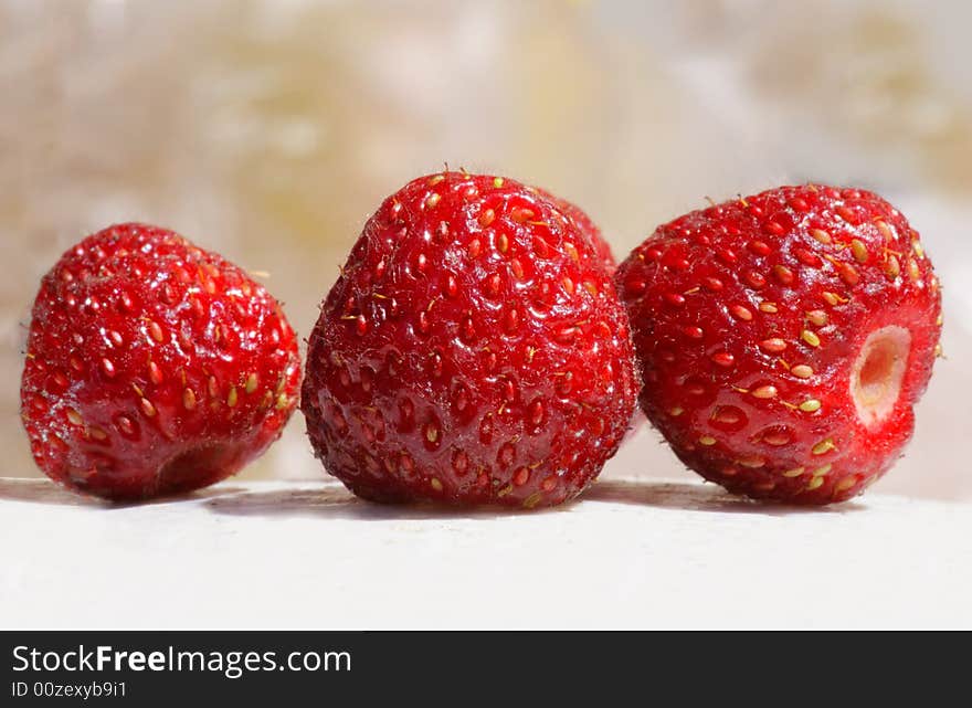 Strawberries against similar to whipped cream (yoghurt).