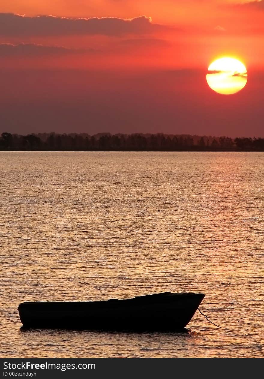 Boat At Sunset