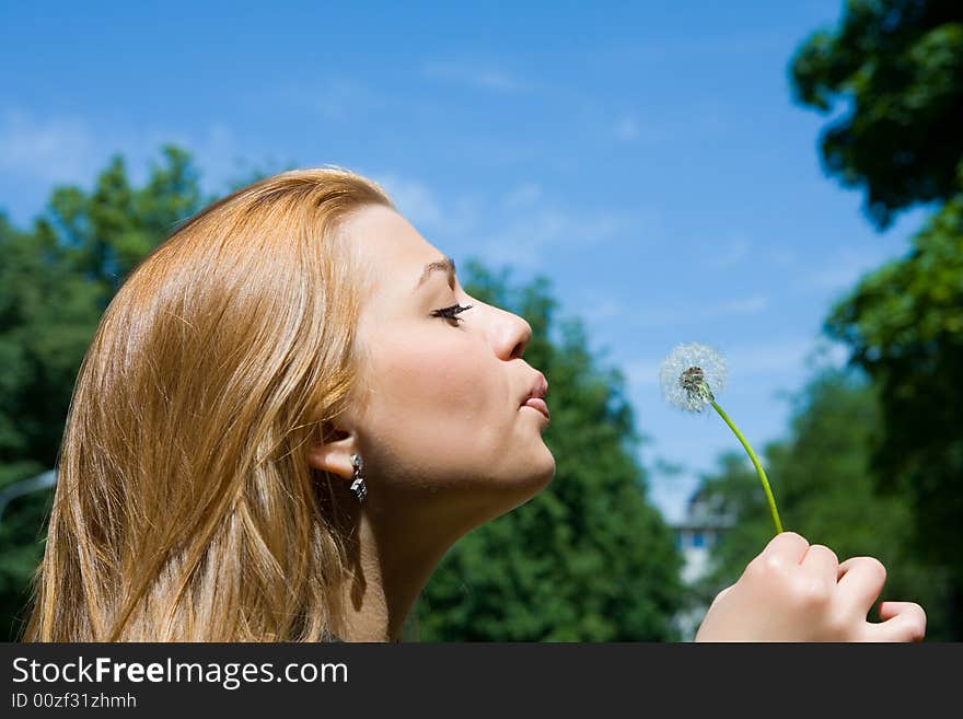 Girl And Dandelion