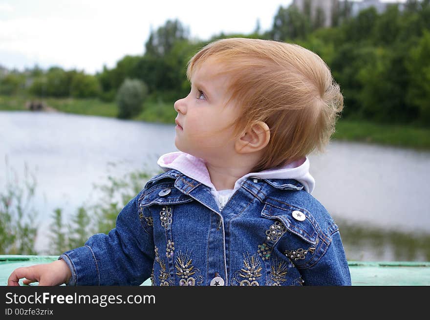 Girl Near A Beautiful Lake