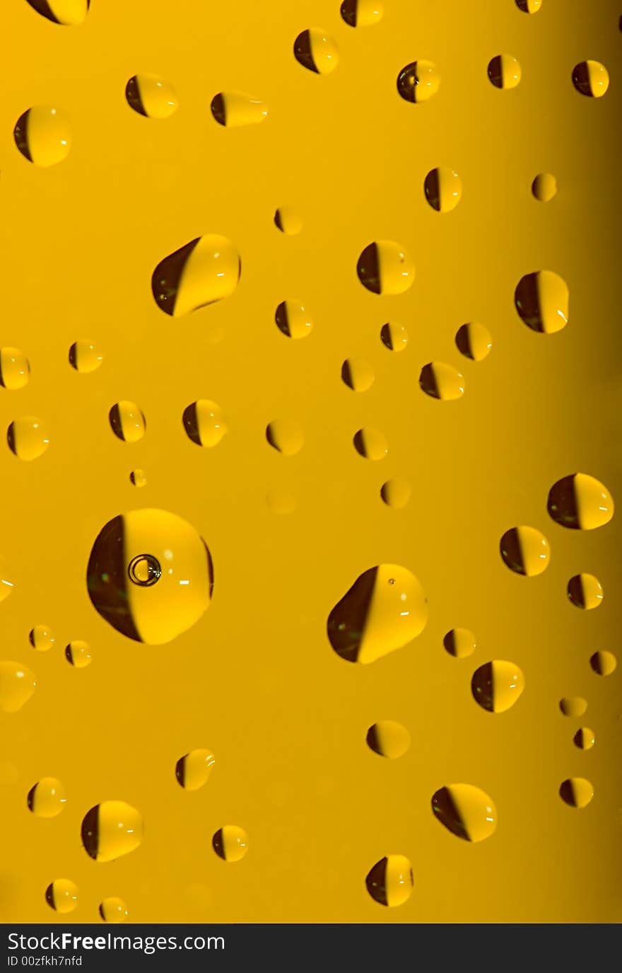 A lot of drops on yellow background