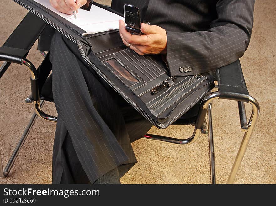 Man taking note at a conference. Man taking note at a conference