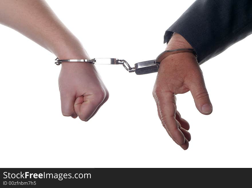 Two people chained together with white background. Two people chained together with white background