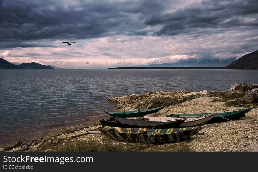 Waterscape with boats,dramatic sky