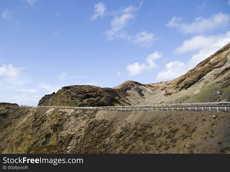 A road under blue sky in Hawaii