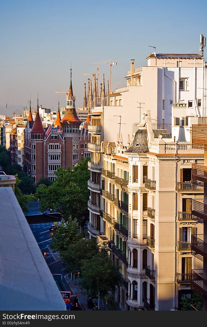 Streets of Barcelona, Spain with Sagrada Familia temple in the background