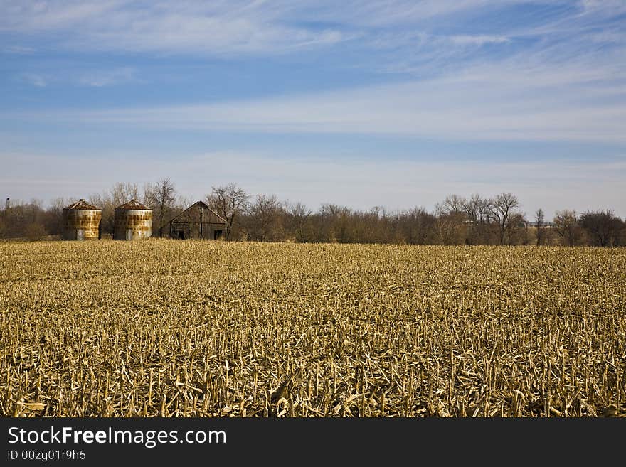 Field with woodline and structures. Field with woodline and structures