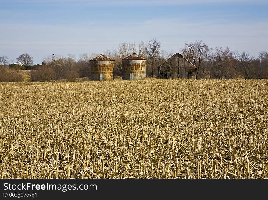 Early spring field with structures. Early spring field with structures