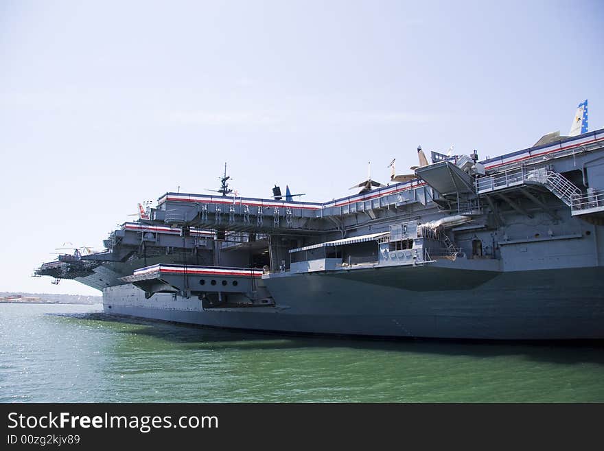 A US aircraft carrier in port at San Diego