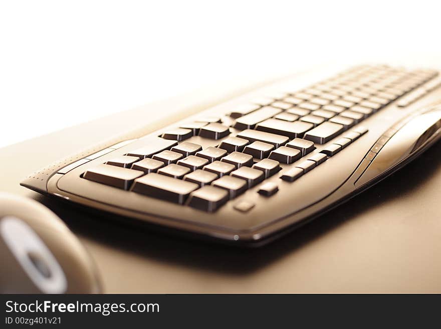 Abstract of a computer keyboard and mouse with slight burnout on top, suitable for background image or conceptual design. Abstract of a computer keyboard and mouse with slight burnout on top, suitable for background image or conceptual design.