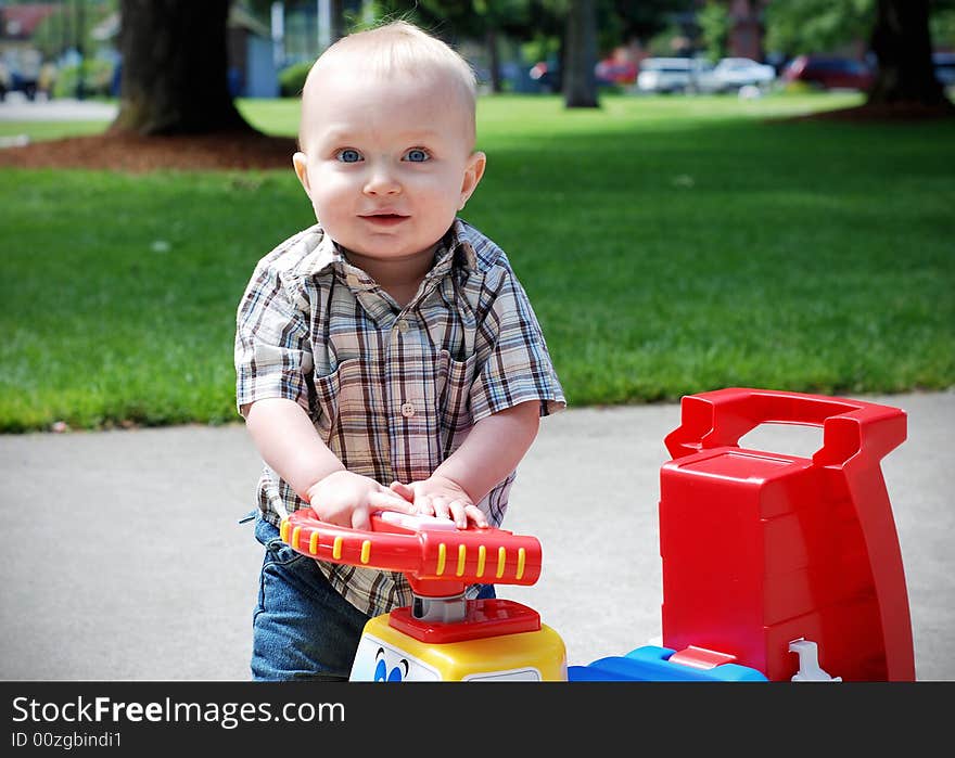 Baby Playing With Toy Truck - Horizontal