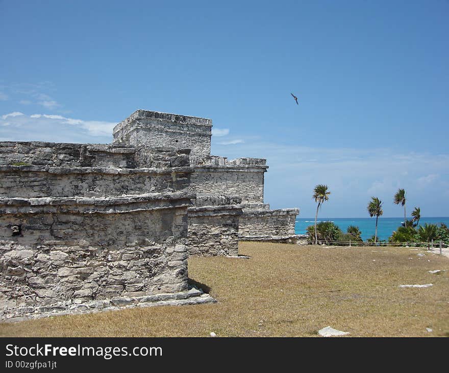 A set of mayan buildings looking to the blue caribe at Tulum, close to Cancun. A set of mayan buildings looking to the blue caribe at Tulum, close to Cancun