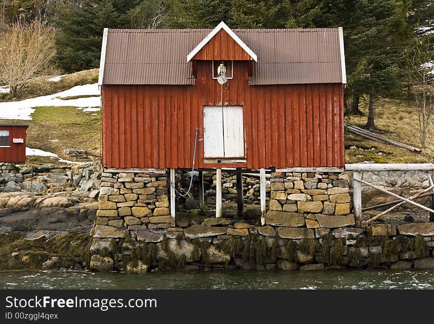 Red house at the sea