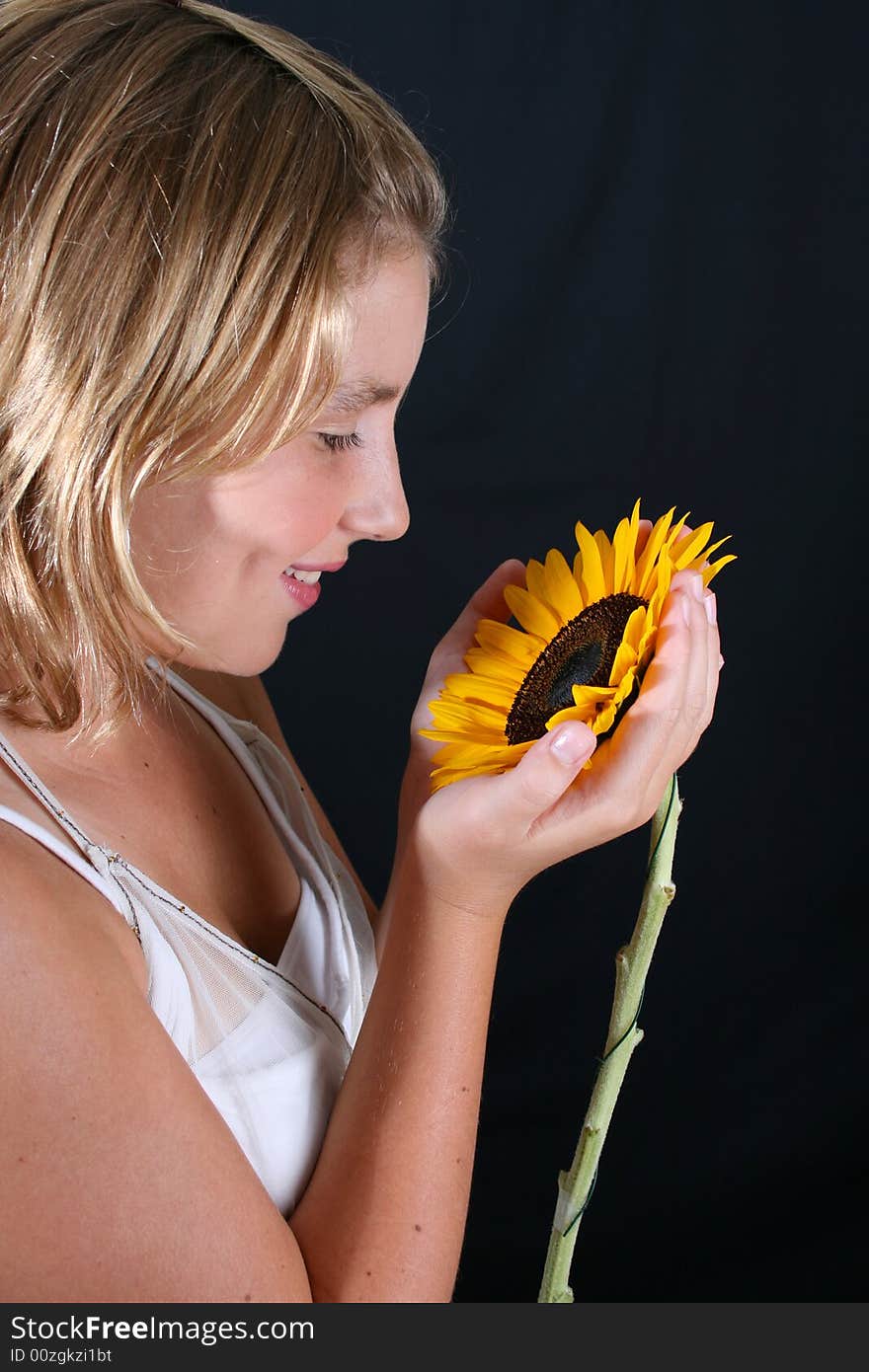 Teenage female model on a black background. Teenage female model on a black background