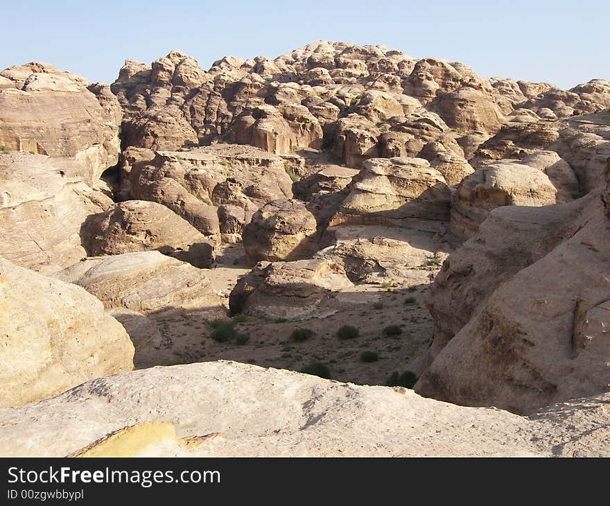 Archaeological site of Petra in Jordan surrounded by beautiful mountains. Archaeological site of Petra in Jordan surrounded by beautiful mountains