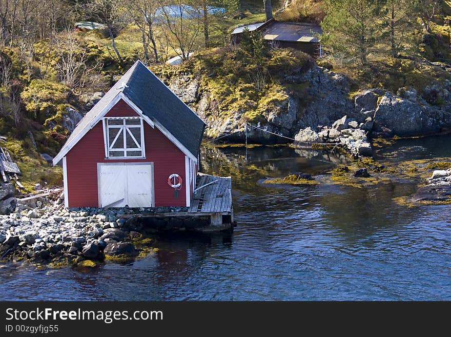 Red house at the sea