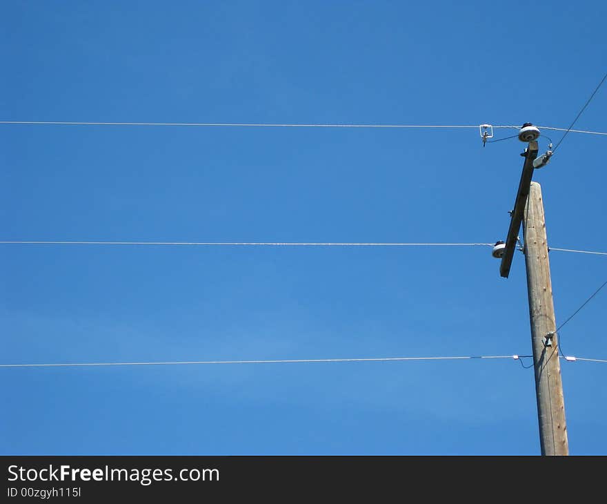 Power Lines  Below A Clear Sky