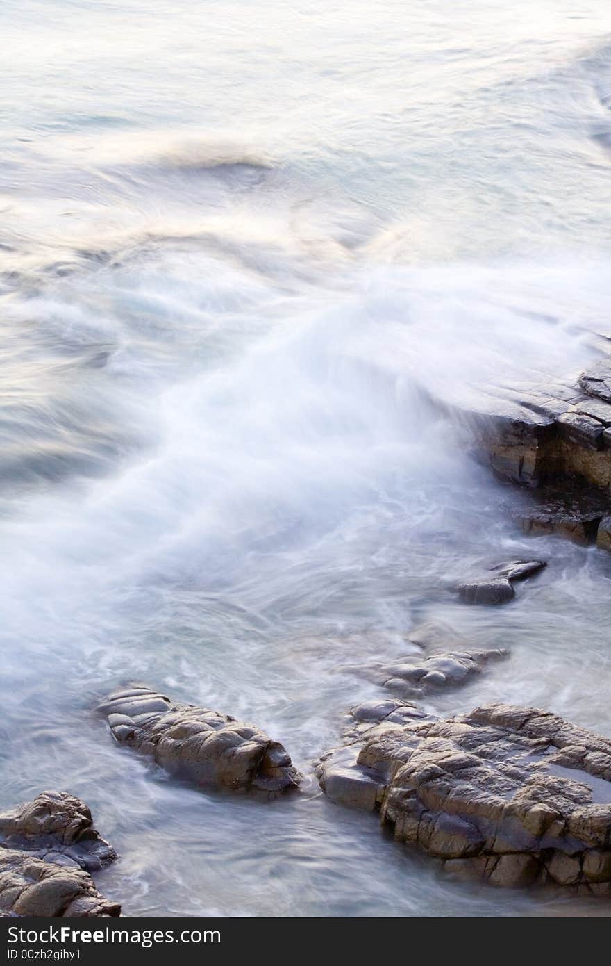 Wave washing on Boiling Pot Rocks, Noosa, Queensland, Australia, using a long exposure to blur water. Wave washing on Boiling Pot Rocks, Noosa, Queensland, Australia, using a long exposure to blur water.