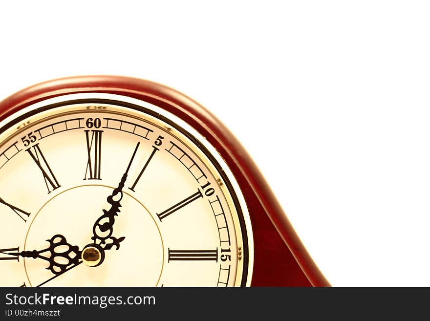 Clock against white background with two hands.