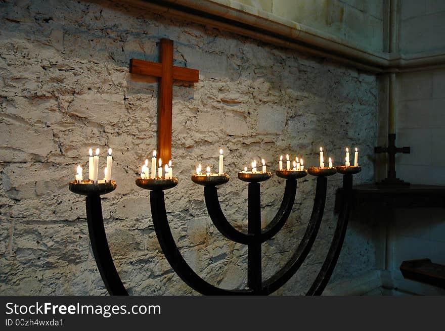 A row of candles at the church altar (religion theme)