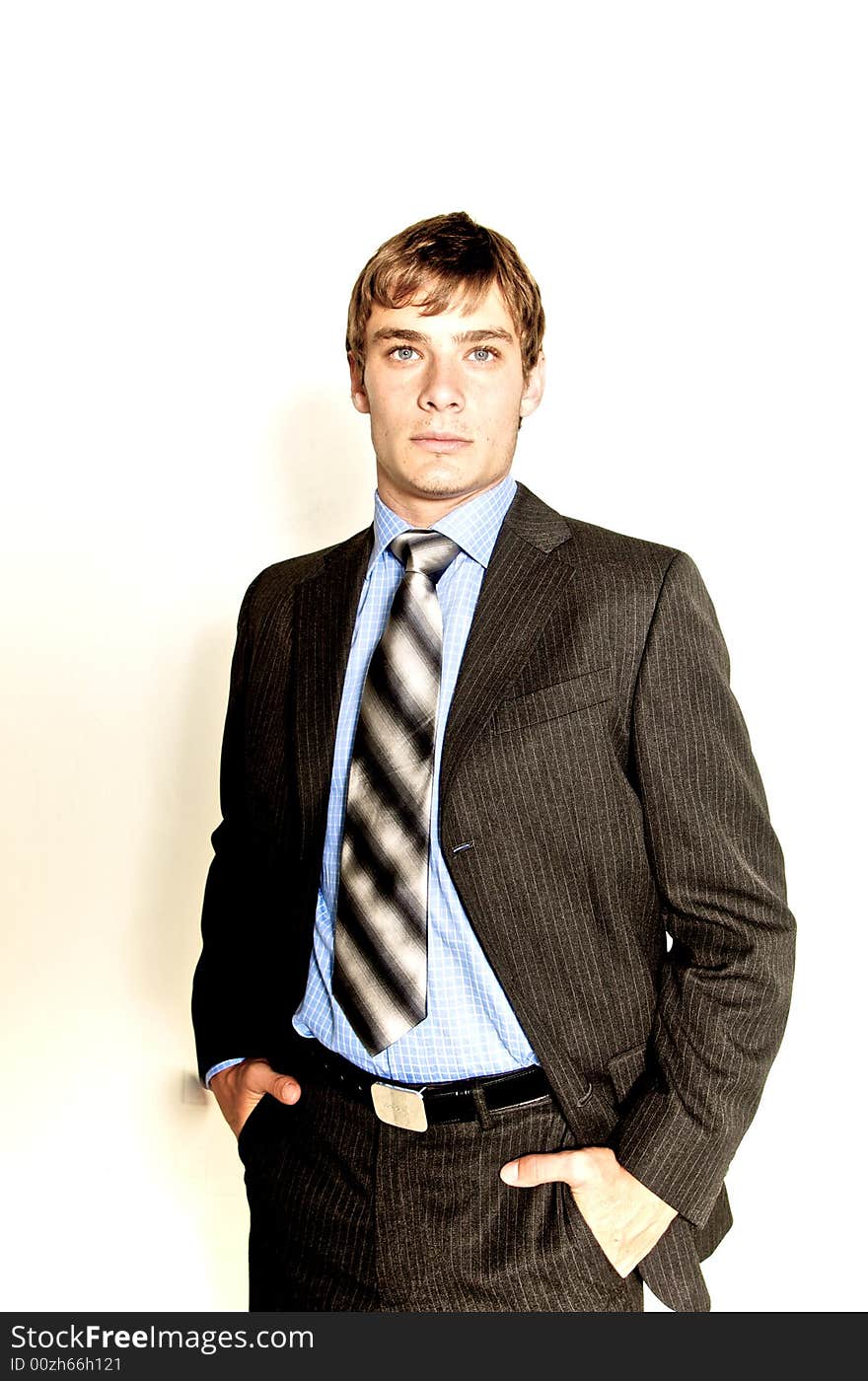 A male model photographed in the studio.