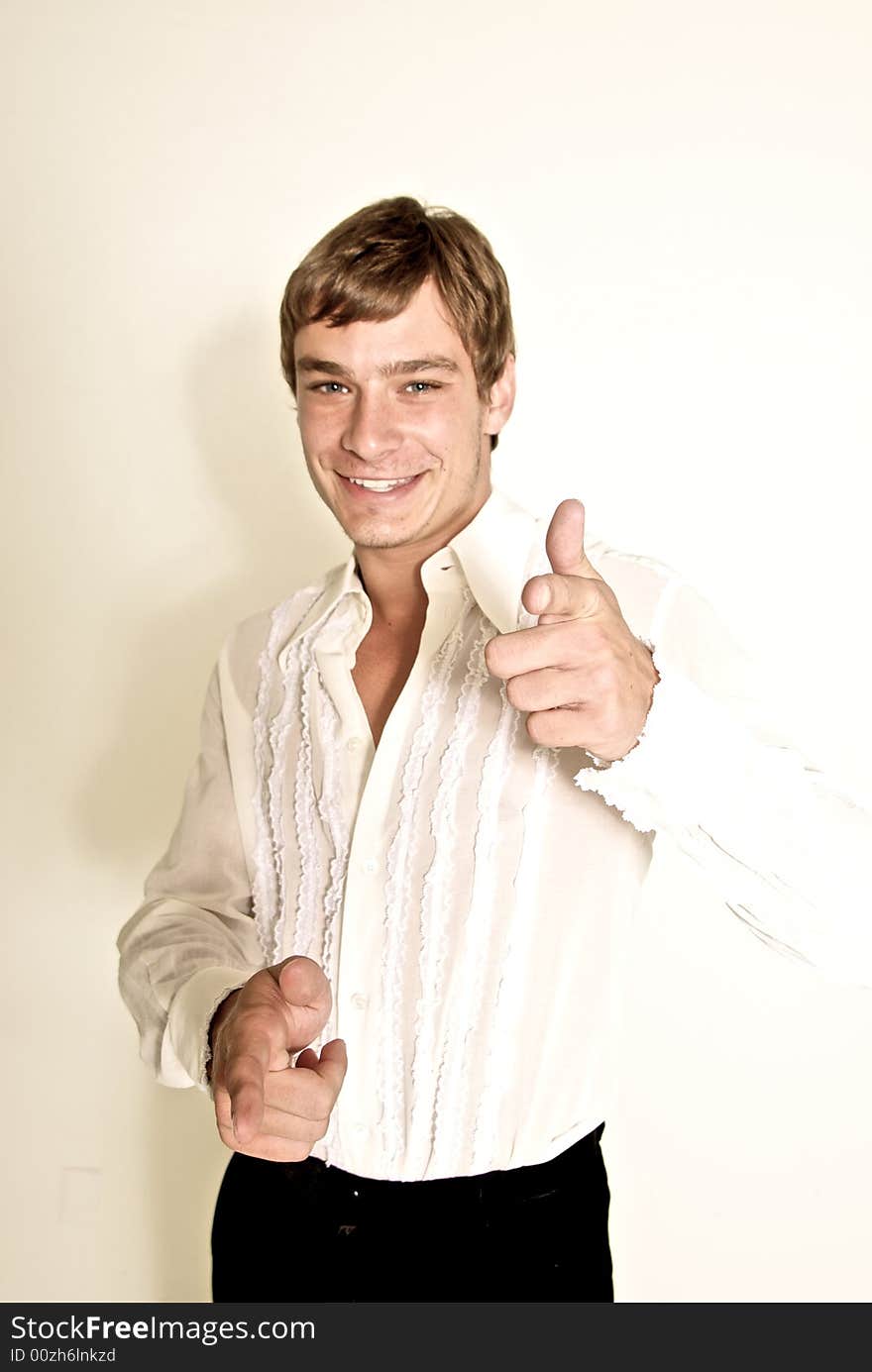 A male model photographed in the studio.