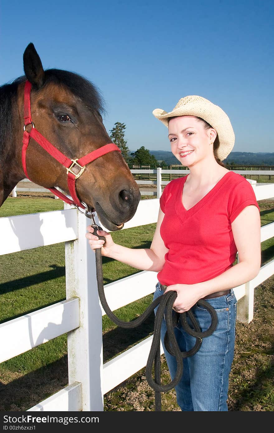 Woman in Cowboy Hat With Horse - Vertical