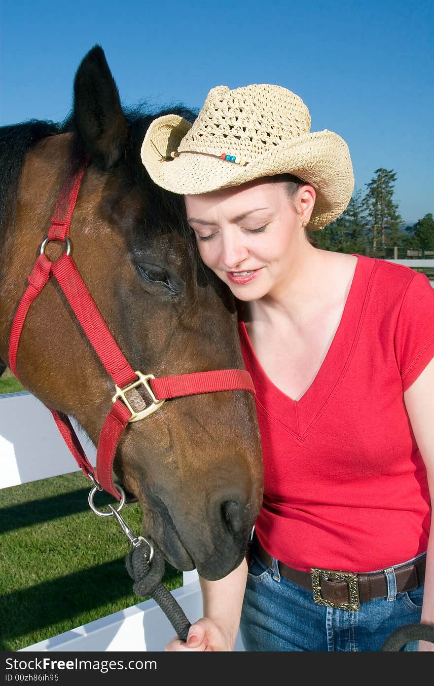 Woman in Cowboy Hat With Horse - Vertical