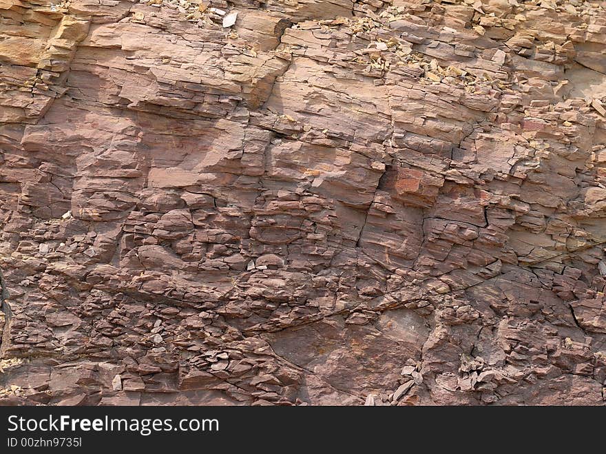 Isolated red rock wall texture. Isolated red rock wall texture