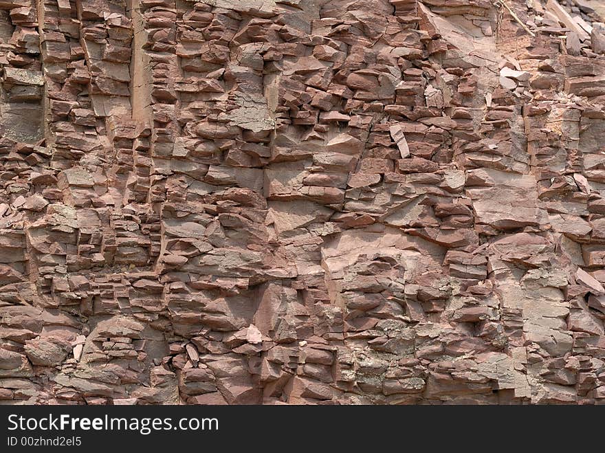 Isolated red rock wall texture. Isolated red rock wall texture