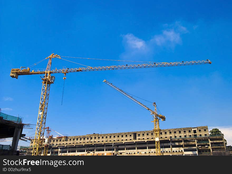 Construction building site with cranes