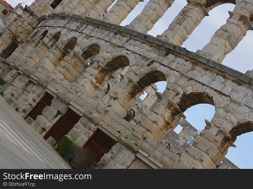 Pula (Croatia) postcard: Roman amphitheatre Arena; sightseeing attraction and venue for various events such as concerts, gladiator games performances, etc. Pula (Croatia) postcard: Roman amphitheatre Arena; sightseeing attraction and venue for various events such as concerts, gladiator games performances, etc.