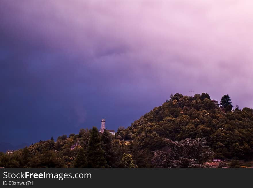 Castle On Mountain With Stormy Sky